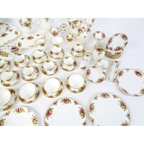 193 - A quantity of Royal Albert dinner and tea wares decorated in the Old Country Roses pattern to includ... 