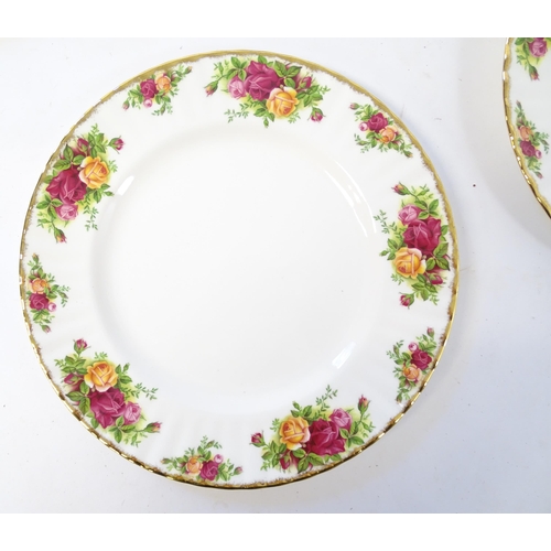 193 - A quantity of Royal Albert dinner and tea wares decorated in the Old Country Roses pattern to includ... 