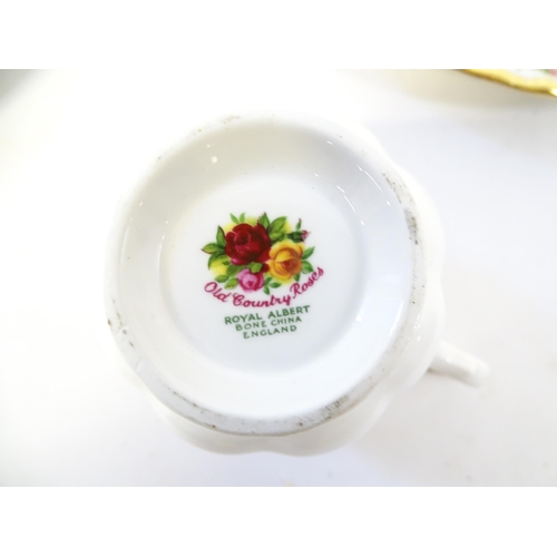 193 - A quantity of Royal Albert dinner and tea wares decorated in the Old Country Roses pattern to includ... 