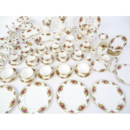 193 - A quantity of Royal Albert dinner and tea wares decorated in the Old Country Roses pattern to includ... 