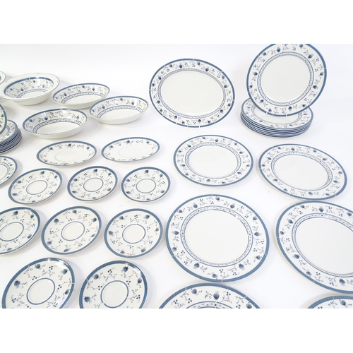 194 - A quantity of Royal Doulton dinner wares decorated in the Cambridge pattern to include plates, servi... 