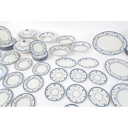 194 - A quantity of Royal Doulton dinner wares decorated in the Cambridge pattern to include plates, servi... 