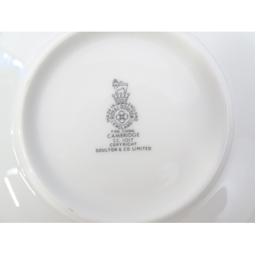 194 - A quantity of Royal Doulton dinner wares decorated in the Cambridge pattern to include plates, servi... 