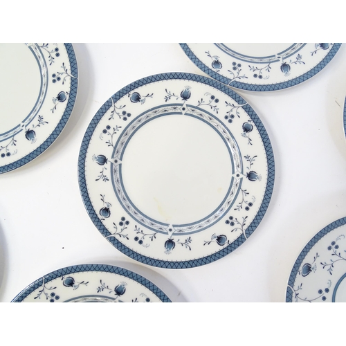 194 - A quantity of Royal Doulton dinner wares decorated in the Cambridge pattern to include plates, servi... 