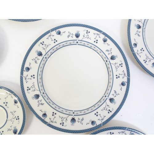 194 - A quantity of Royal Doulton dinner wares decorated in the Cambridge pattern to include plates, servi... 