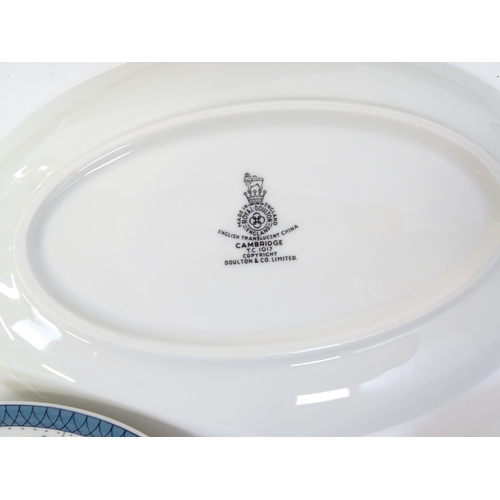 194 - A quantity of Royal Doulton dinner wares decorated in the Cambridge pattern to include plates, servi... 