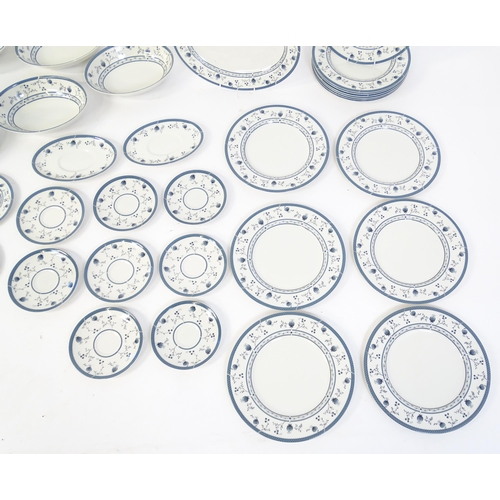 194 - A quantity of Royal Doulton dinner wares decorated in the Cambridge pattern to include plates, servi... 