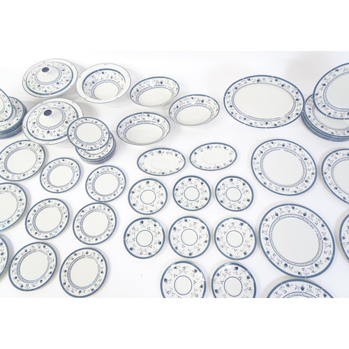 194 - A quantity of Royal Doulton dinner wares decorated in the Cambridge pattern to include plates, servi... 