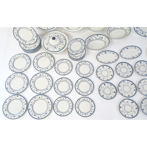 194 - A quantity of Royal Doulton dinner wares decorated in the Cambridge pattern to include plates, servi... 