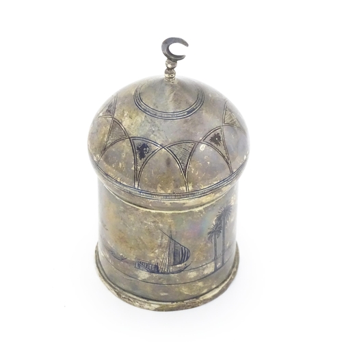 522 - An Egyptian white metal pot and cover modelled as a minaret dome with crescent moon finial, having n... 