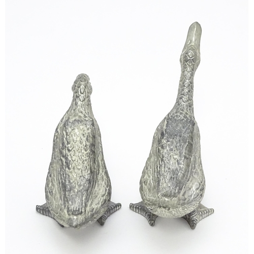 525 - A pair of silver plate models of geese. Approx. 2 1/2