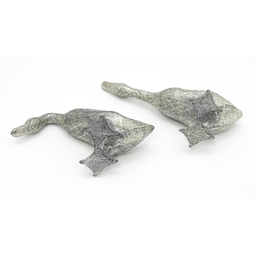 525 - A pair of silver plate models of geese. Approx. 2 1/2