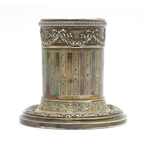 528 - A German .800 silver candle stand of squat column form with swag detail. Approx. 3