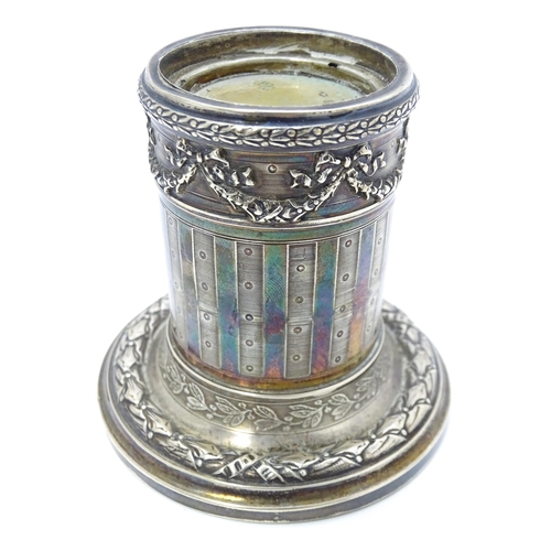 528 - A German .800 silver candle stand of squat column form with swag detail. Approx. 3