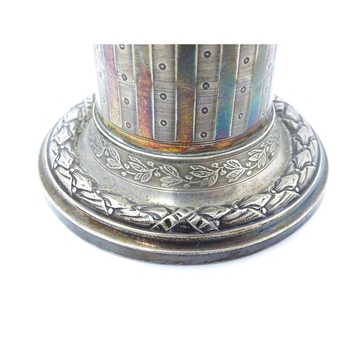 528 - A German .800 silver candle stand of squat column form with swag detail. Approx. 3