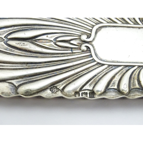 530 - A Victorian silver pen dish / tray with embossed decoration hallmarked London 1897, maker William Hu... 