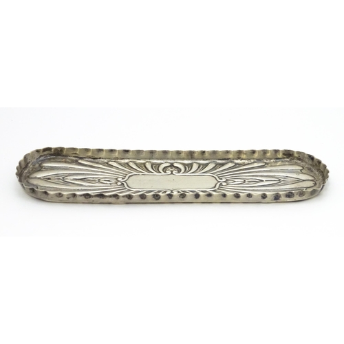 530 - A Victorian silver pen dish / tray with embossed decoration hallmarked London 1897, maker William Hu... 