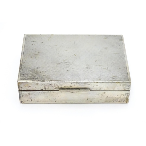 531 - A Continental .800 silver cigarette box with engine turned decoration and wood lined interior. Appro... 