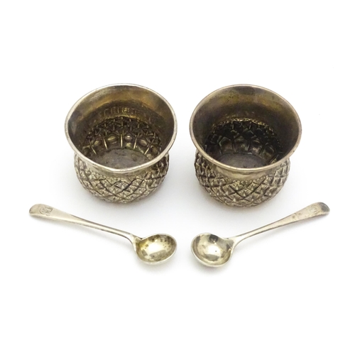 539A - A pair of Victorian silver salts of stylised thistle form, hallmarked Chester 1899, maker John Millw... 