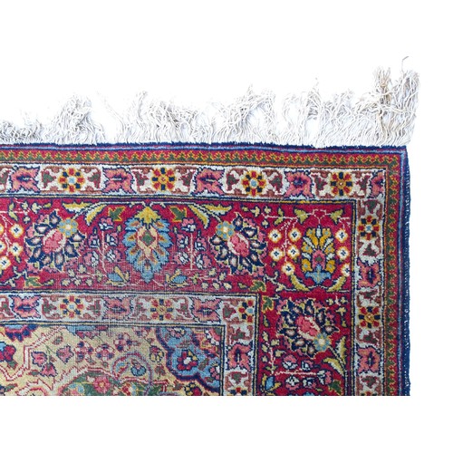 1502 - Carpet / Rug : A blue and cream ground rug profusely decorated with scrolling floral and foliate dec... 