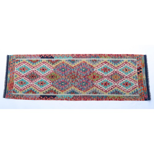 1508 - Carpet / Rug: A Turkish Anatolian kilim runner with repeated geometric decoration. Approx. 100