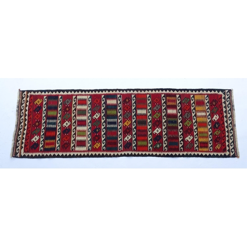 1515 - Carpet / Rug: A South West Persian Qashqai kilim with banded geometric decoration. Approx. 101