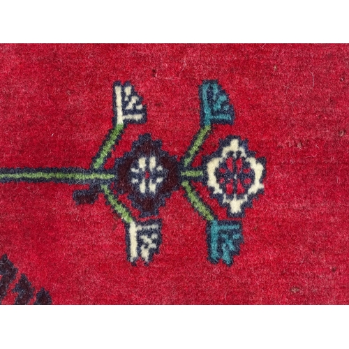 1516 - Carpet / Rug: A South West Persian Qashqai rug the red ground decorated with geometric motifs. Appro... 