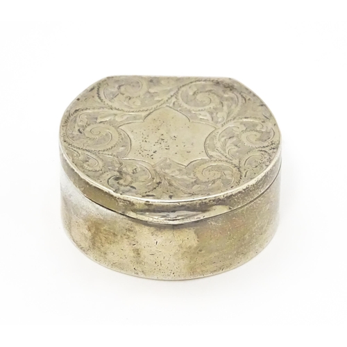 459 - A Victorian silver pill box with engraved acanthus scroll decoration, hallmarked Birmingham 1896, ma... 