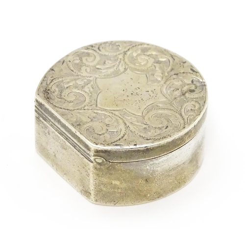 459 - A Victorian silver pill box with engraved acanthus scroll decoration, hallmarked Birmingham 1896, ma... 