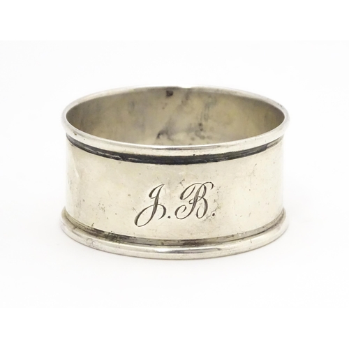 465 - A silver napkin ring hallmarked Chester 1915, maker Charles Horner