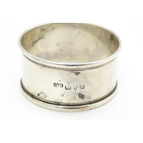 465 - A silver napkin ring hallmarked Chester 1915, maker Charles Horner