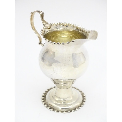 470 - A Geo III silver cream jug hallmarked London 1773, maker Ann Smith & Nathaniel Appleton. Approx. 4