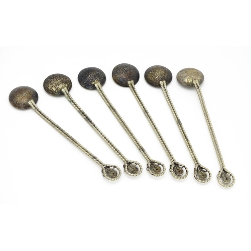 472 - A set of six white metal spoons with tongs en suite with coin formed bowls. Together with an anchovy... 