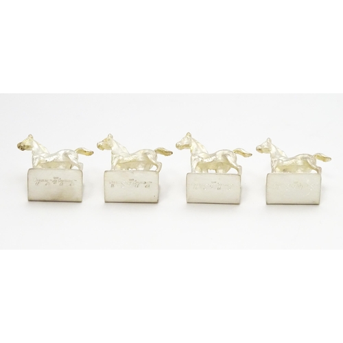 473 - A set of four Elizabeth II hallmarked silver menu / place card holders with horse detail, maker Came... 