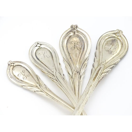 477 - A quantity of assorted Victorian silver Lily pattern items to include a sauce ladle, pickle fork, bu... 