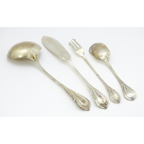 477 - A quantity of assorted Victorian silver Lily pattern items to include a sauce ladle, pickle fork, bu... 