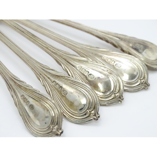 478 - A set of five Victorian silver Lily pattern dessert spoons hallmarked Sheffield 1898, maker John Rou... 