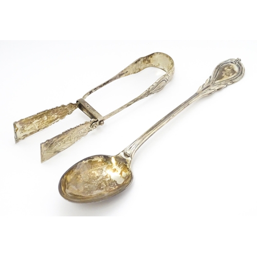 484 - A Victorian silver Lily pattern stuffing / basting spoon. Together with Victorian silver Lily patter... 