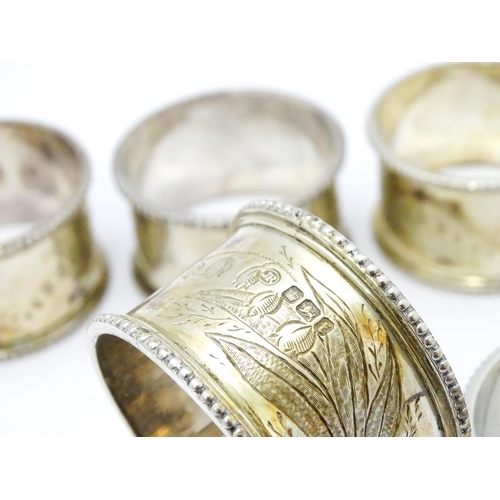 485 - Six Victorian silver napkin rings with engraved Lily of the Valley decoration, hallmarked Sheffield ... 