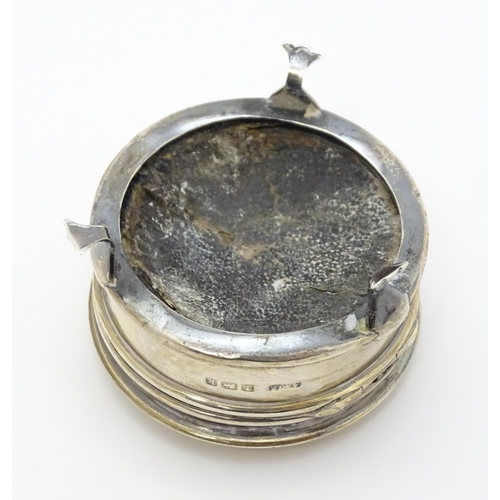 491 - A small silver ring box raised on three feet, hallmarked Birmingham 1909, maker A & J Zimmerman Ltd.... 