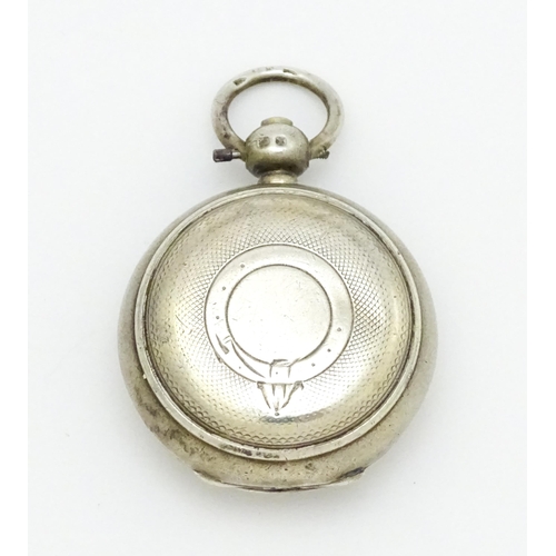 498 - A Victorian silver sovereign case / carrier with engine turned decoration and horseshoe detail withi... 