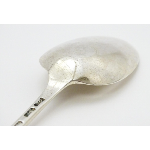 501 - An 18thC silver Old English pattern dessert spoon hallmarked London 1777, maker George Smith. Approx... 