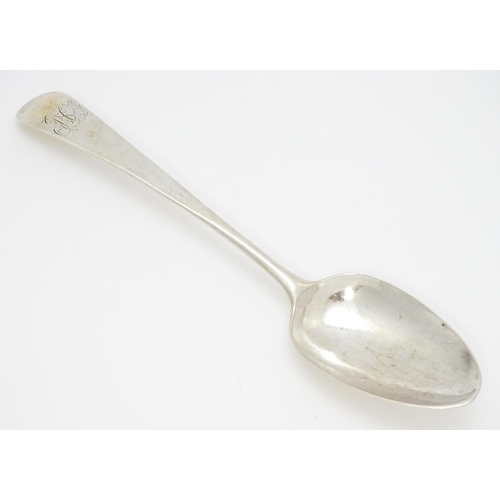 501 - An 18thC silver Old English pattern dessert spoon hallmarked London 1777, maker George Smith. Approx... 