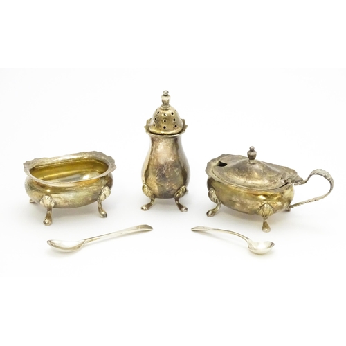 507 - A silver three piece cruet set comprising, salt, pepper and mustard with salt spoon, hallmarked Birm... 