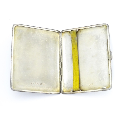 546 - A silver cigarette case with engine turned decoration hallmarked Birmingham 1953, maker Frederick Fi... 