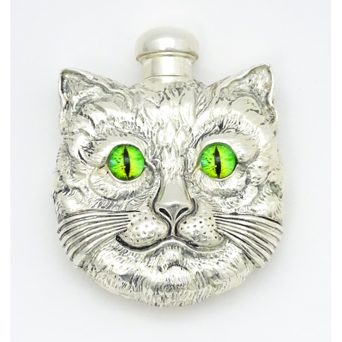 548 - A novelty white metal scent bottle / flask modelled as a cat. Approx. 2 3/4