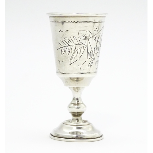 553 - A Russian silver kiddish cup with engraved decoration. Approx. 3 1/2