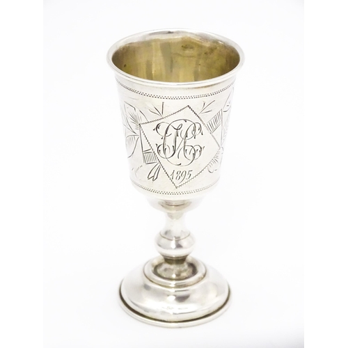 553 - A Russian silver kiddish cup with engraved decoration. Approx. 3 1/2