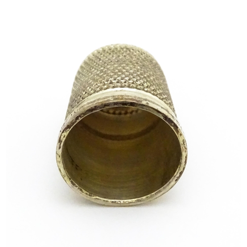 557 - A sterling silver thimble maker Henry Griffith & Sons Ltd.