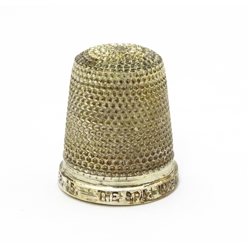 557 - A sterling silver thimble maker Henry Griffith & Sons Ltd.